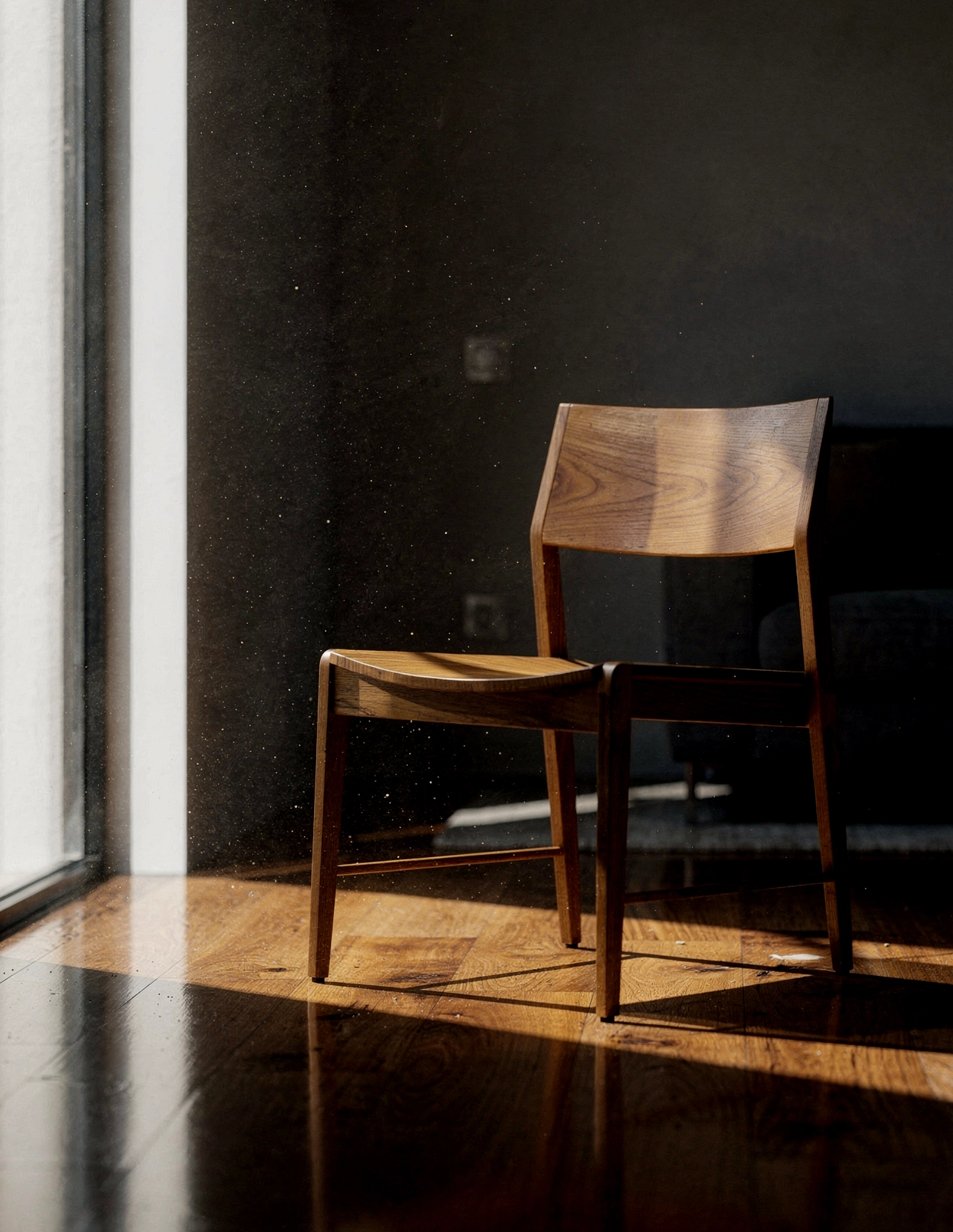 chair in the dark with sunlight beaming on it