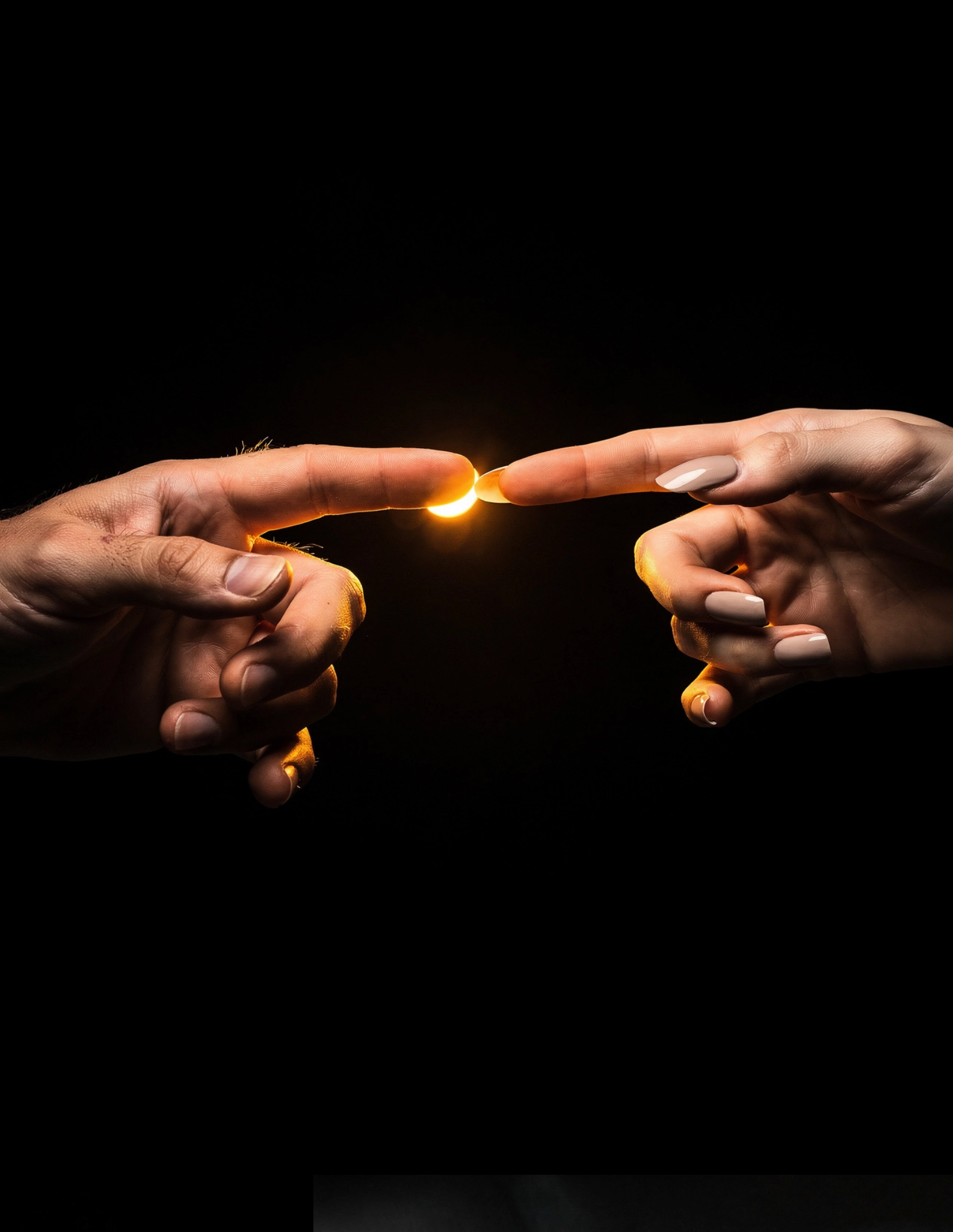 pointed male and female hands almost touching